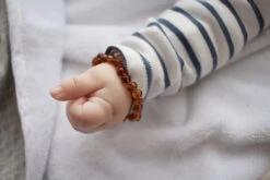 Bracelet D'Ambre Bébé Cognac IRREVERSIBLE BIJOUX -Bébés Produits Magasin IRREVERSIBLE BB 1 1COGNS4