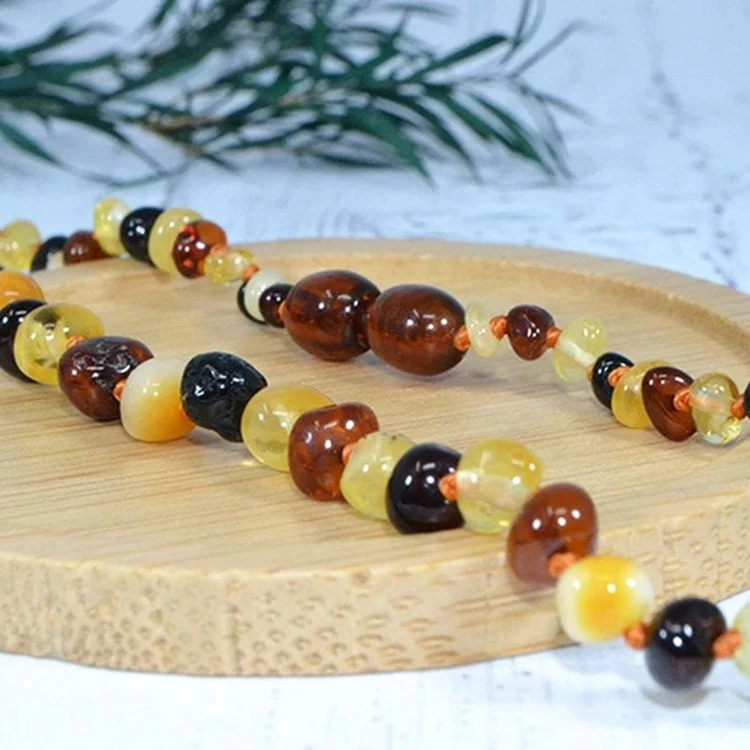 Collier D'Ambre Bébé Multi IRREVERSIBLE BIJOUX 4 Collier D'Ambre Bébé Multi IRREVERSIBLE BIJOUX – Image 2