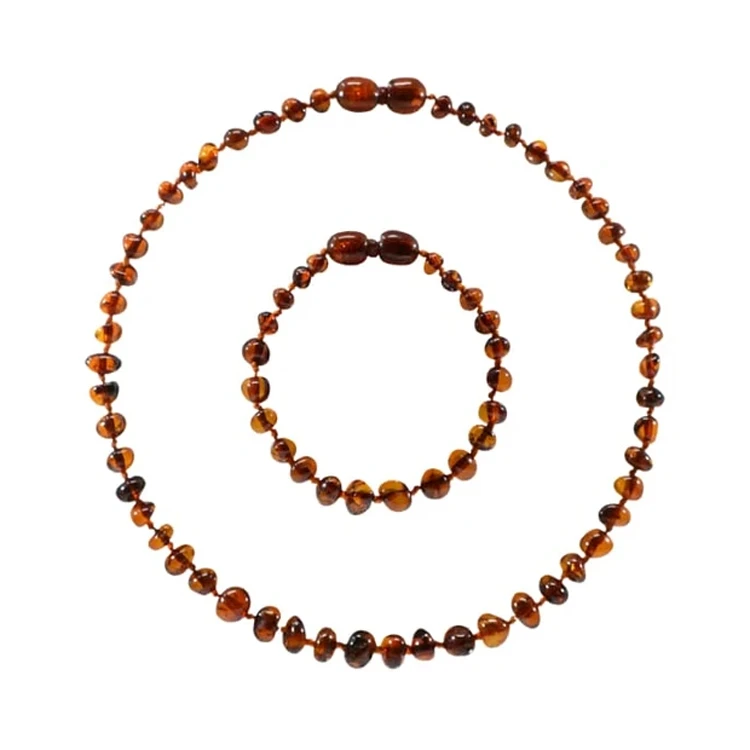 Set Collier Et Bracelet D'Ambre Bébé Cognac IRREVERSIBLE BIJOUX 4 Set Collier Et Bracelet D'Ambre Bébé Cognac IRREVERSIBLE BIJOUX – Image 2